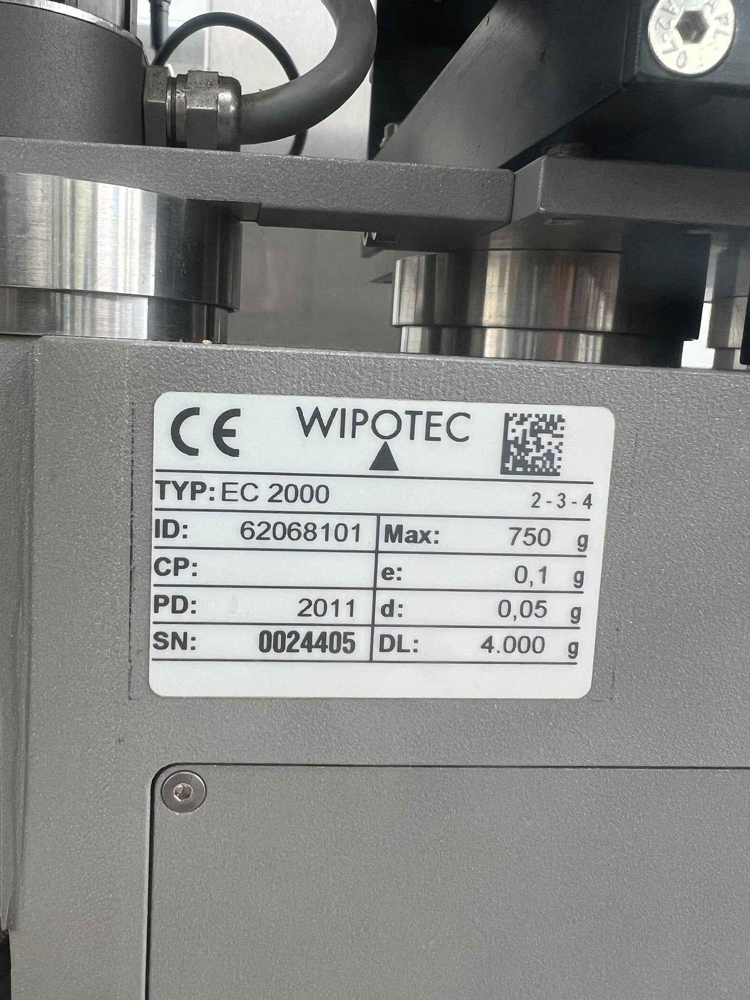 Typenschild der Wipotec EC 2000 Wägezelle mit Maximalwert 750 g, Eichwert e 0,1 g und Teilungswert d 0,05 g